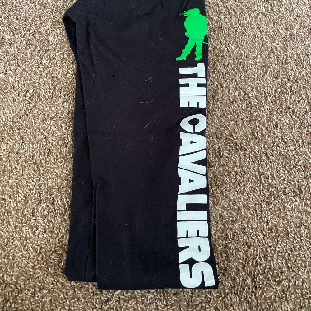 Black leggings with a Cavaliers decal down the leg